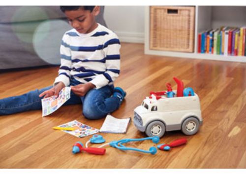 Eco-friendly Green Toys Ambulance & Doctor's Kit with stethoscope, syringe, and vibrant carrying case for imaginative play.