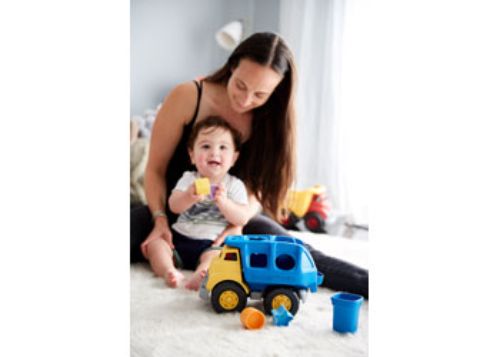 Eco-friendly Green Toys Shape Sorter Truck with hinged bin includes 4 colorful shapes for learning and imaginative play.
