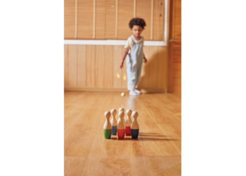 Colorful eco-friendly bowling set for kids, promoting motor skills and teamwork in fun indoor and outdoor play.