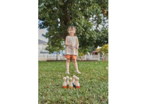 Colorful eco-friendly bowling set for kids, promoting motor skills and social play, perfect for indoor/outdoor fun.