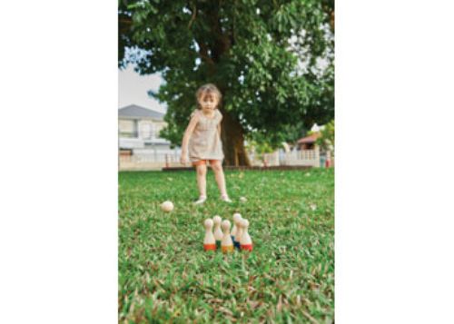 Colorful eco-friendly bowling set for kids, promoting motor skills and social play, perfect for indoor and outdoor fun.