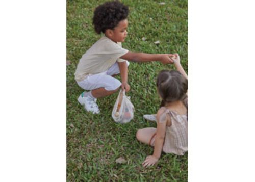 Colorful eco-friendly bowling set for kids, promoting motor skills and imaginative play indoors and outdoors.