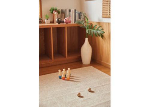 Colorful eco-friendly bowling set for kids aged 2+, promoting motor skills and imaginative outdoor play in a sustainable way.