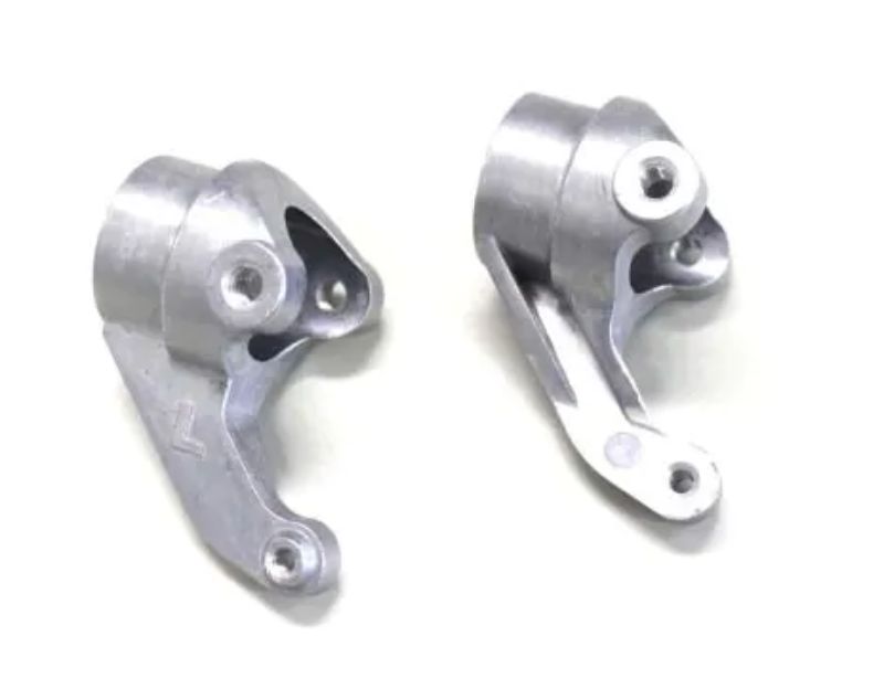 Kyosho MP9 RS Knuckle Arm set for enhanced steering and handling in RC racing vehicles.