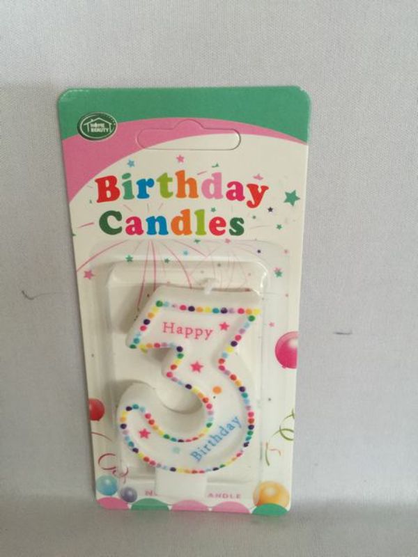 Vibrant set of 12 birthday candles, perfect for enhancing cakes at celebrations with their colorful designs and safe burning.