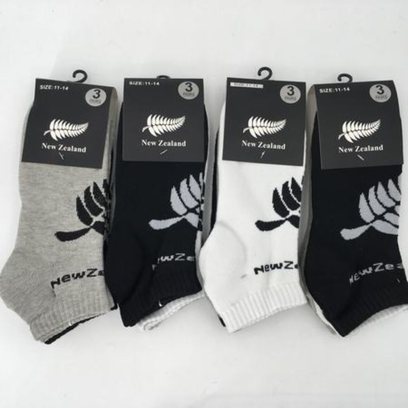 New Zealand assorted socks in sizes 11-14, featuring vibrant designs in a 3-pack for comfort and style.