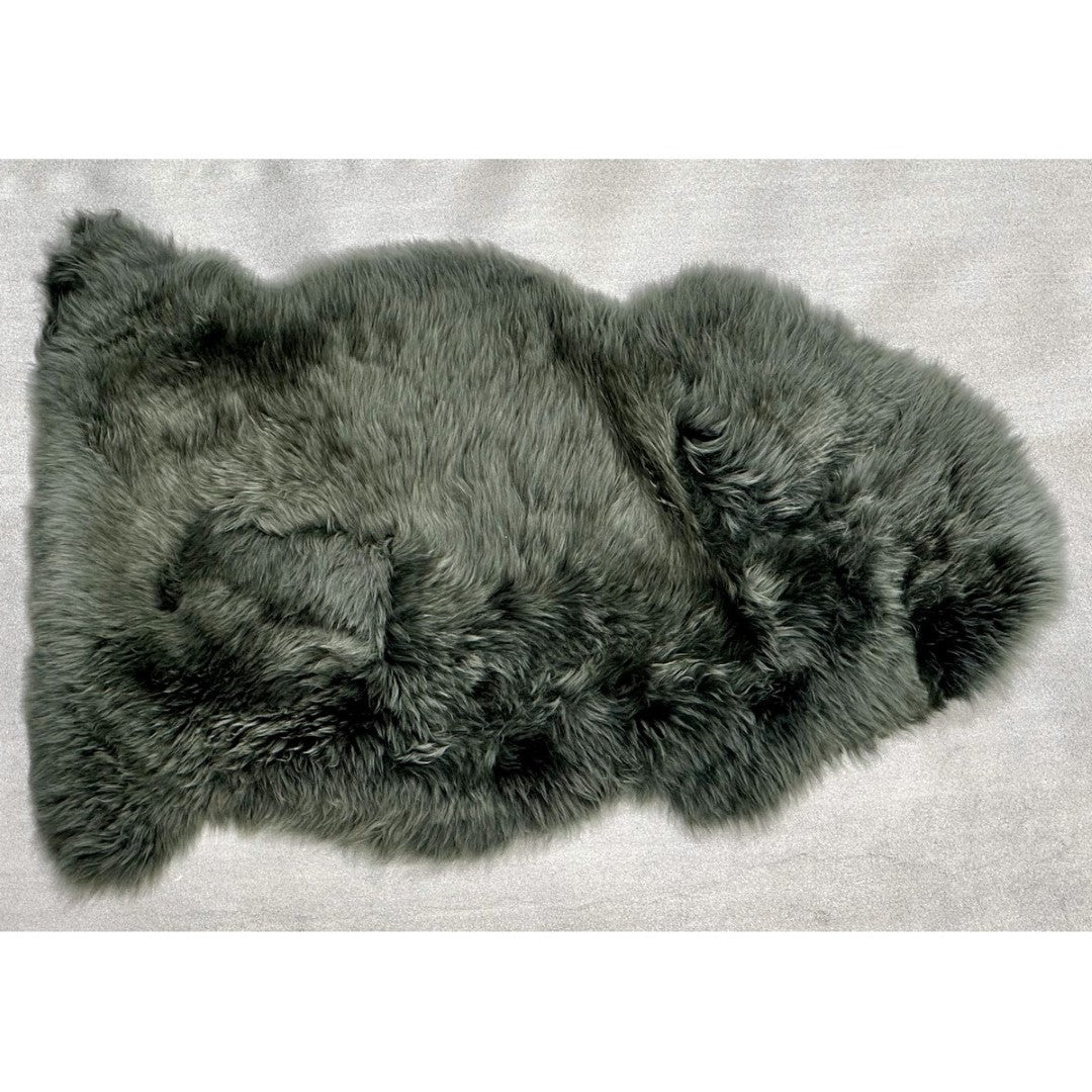 Luxurious thyme-colored New Zealand sheepskin rug, 60 x 90 cm, perfect for draping or adding comfort to any space.