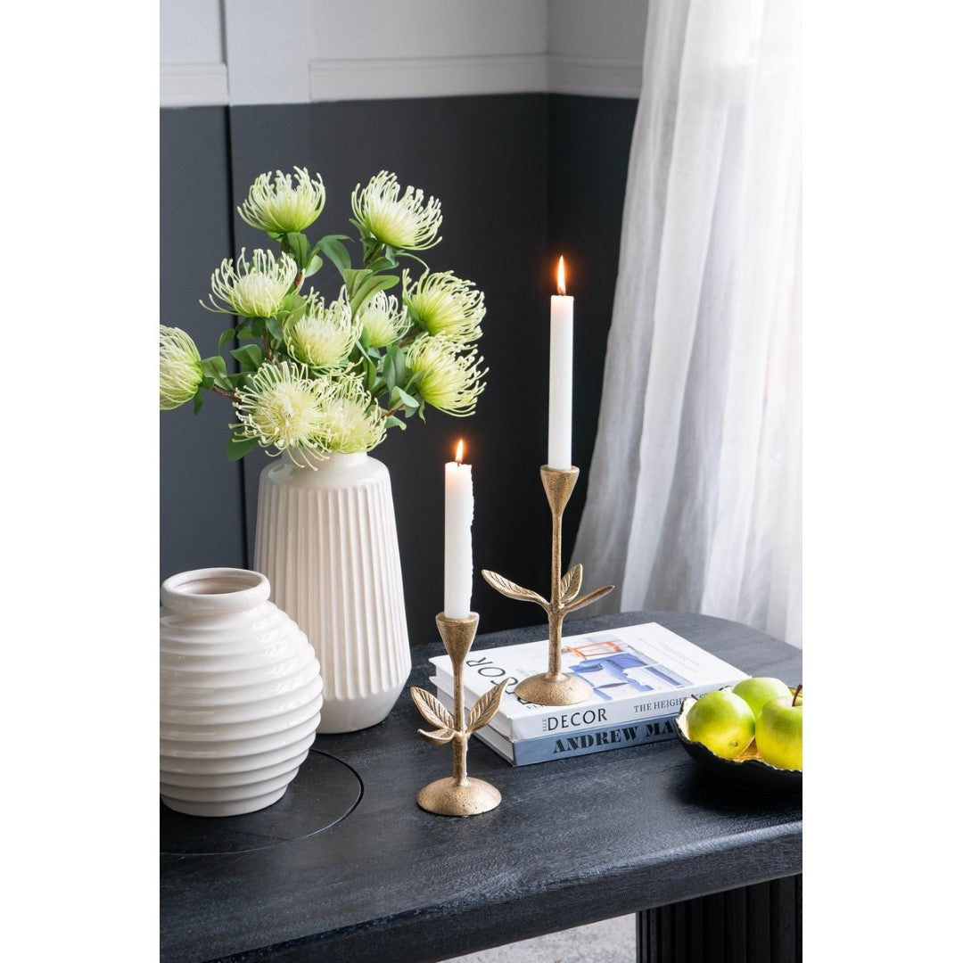 Elegant gold flower candle holders set of 2, perfect for enhancing decor and creating a cozy ambiance in any space.