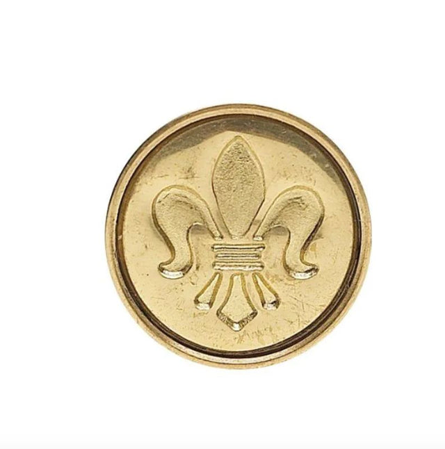 Ceramic Fleur de Lys wax seal set with red wick wax for elegant stationery embellishments.