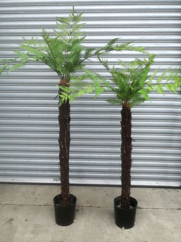 Lifelike 120cm artificial Tree Fern, adding tropical elegance to indoor or outdoor spaces with zero maintenance needed.