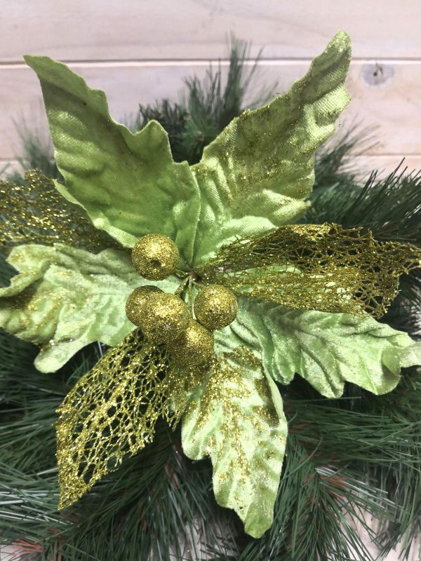 Lush green Poinsettia metal and mesh head, a versatile and durable decor piece for year-round or seasonal elegance.