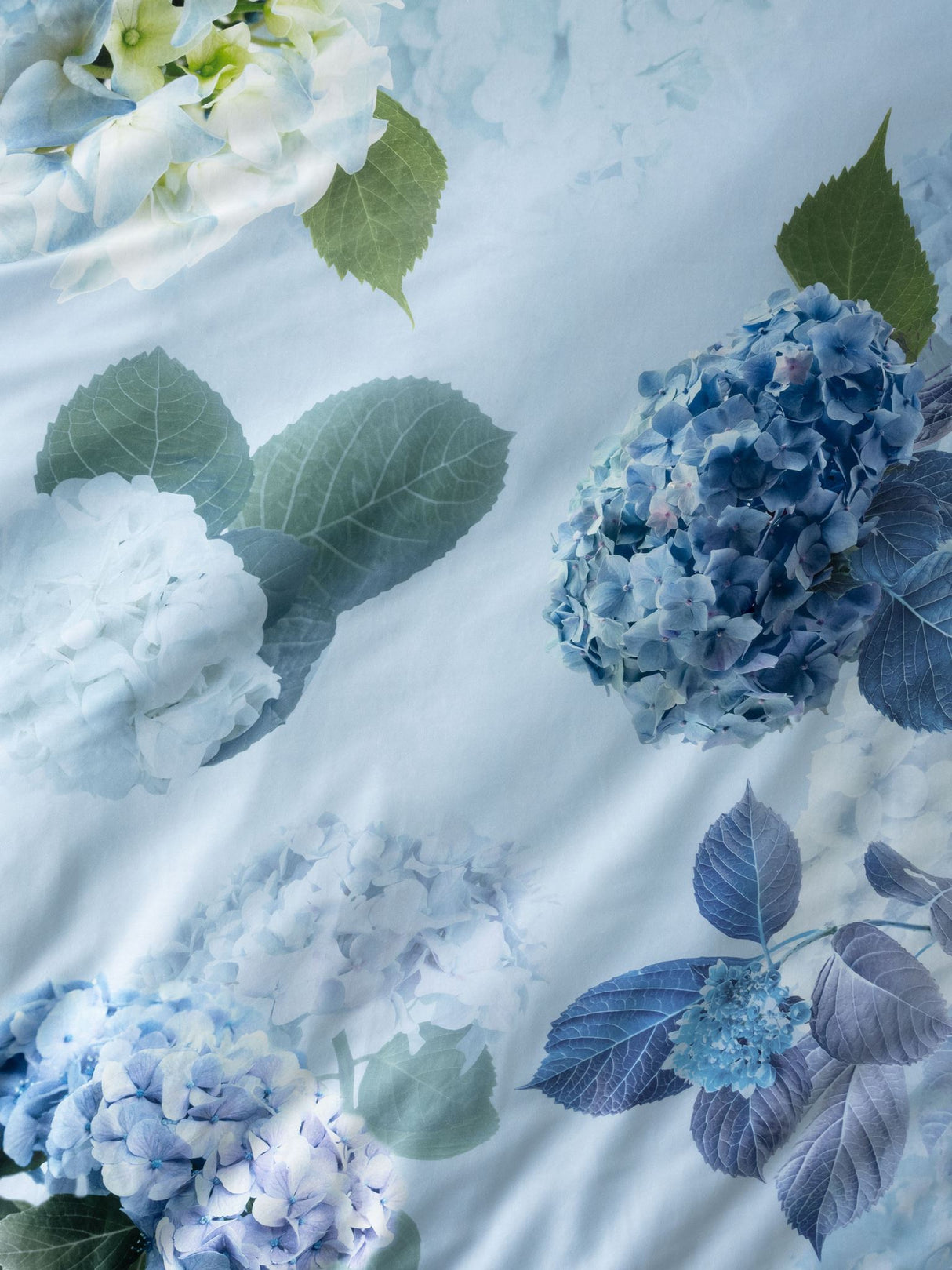Thea Duvet Cover Set by Savona in sage with hydrangea floral pattern, soft cotton for elegant comfort in queen size.