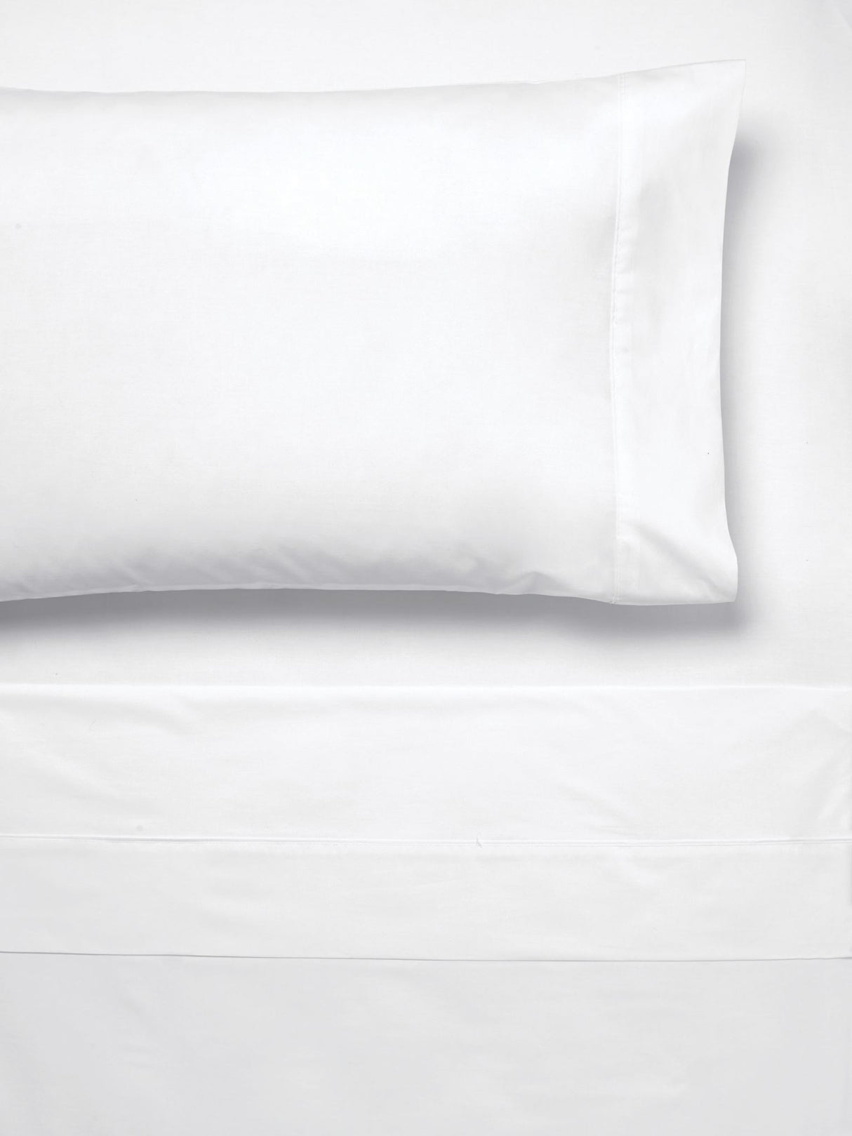 King Single 300T cotton sheet set in white, featuring cuffed pillowcases and a 45cm fitted sheet wall for a modern bedroom look.