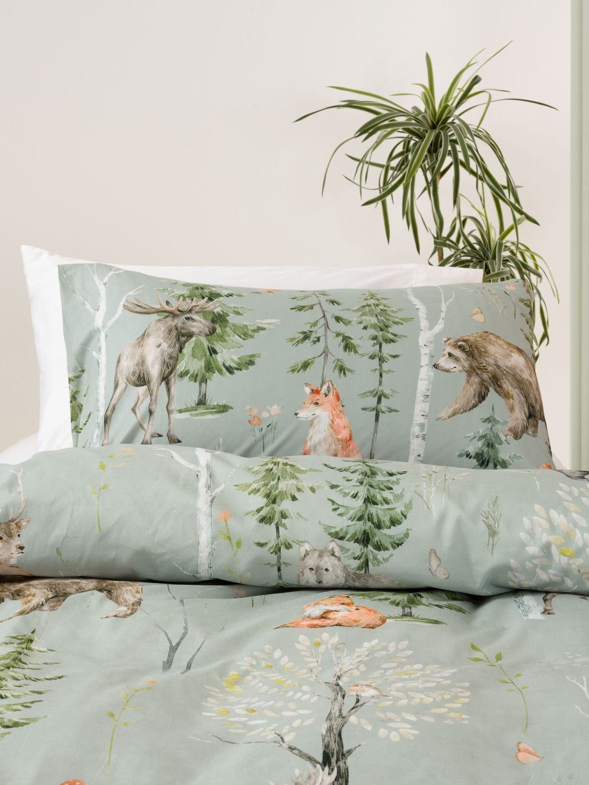 Single duvet cover set in sage featuring hand-painted woodland animals, ideal for a child's magical forest-themed bedroom.