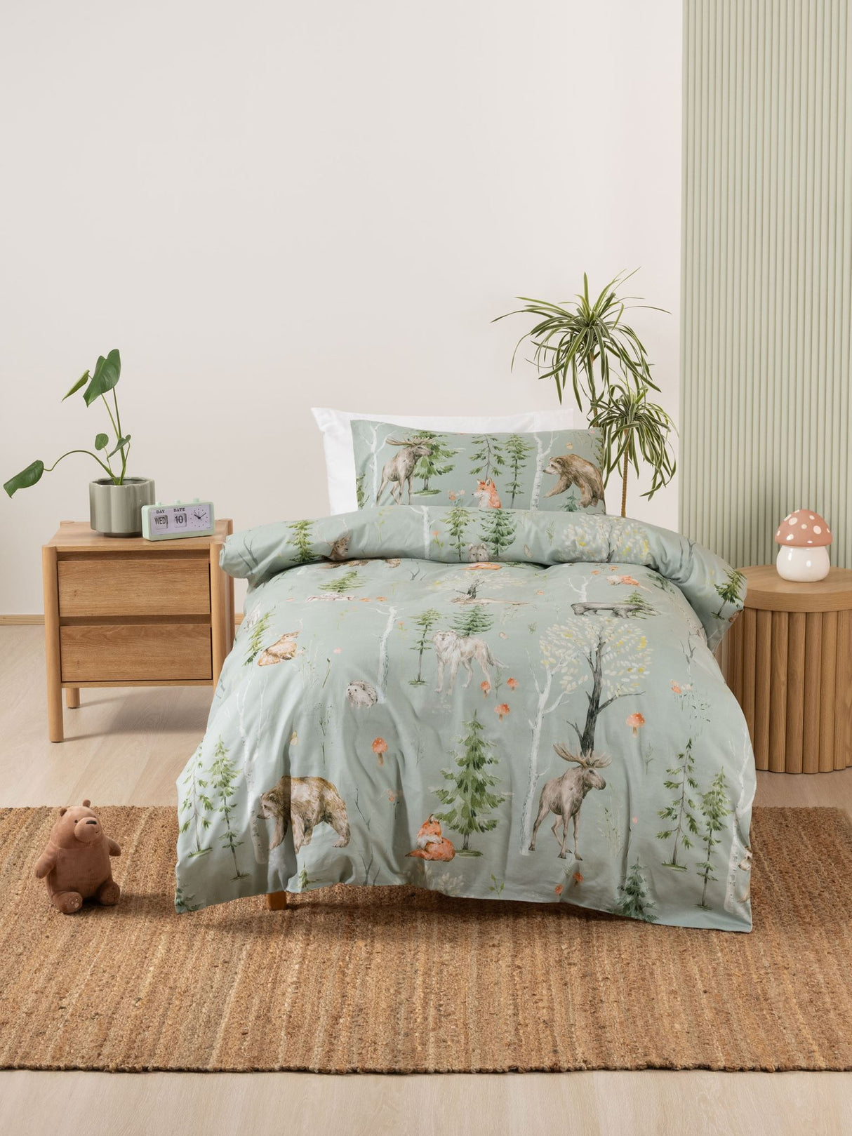 Single duvet cover set featuring enchanting woodland animals on a sage green background, made from soft 100% cotton.