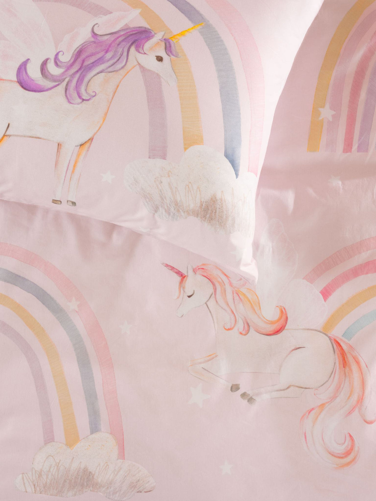 Single Duvet Cover Set featuring hand-drawn unicorns and rainbows on a pink background, crafted from 100% cotton.