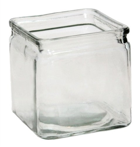 Clear glass cube decor piece, ideal for showcasing items or as a candle holder, featuring a sleek, minimalist design.