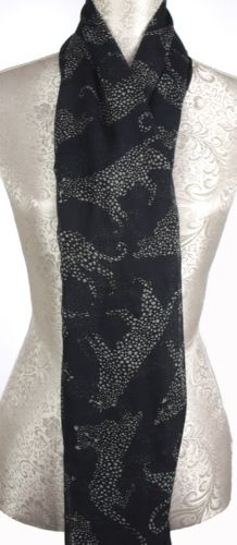 Black Leopard Scarf in premium polyester, featuring a striking leopard print for versatile styling and added elegance.