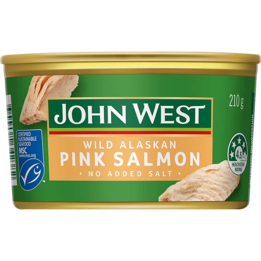Canned John West pink wild Alaskan salmon, known for its delicate flavor, flaky texture, and no added salt or preservatives.
