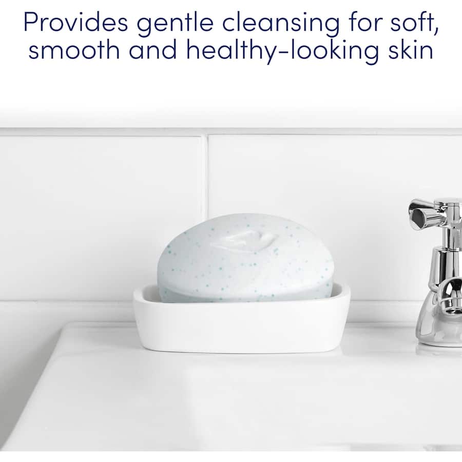 Dove Exfoliating Soap Bar, enriched with moisturizing cream and gentle beads, for soft, smooth, and revitalized skin.