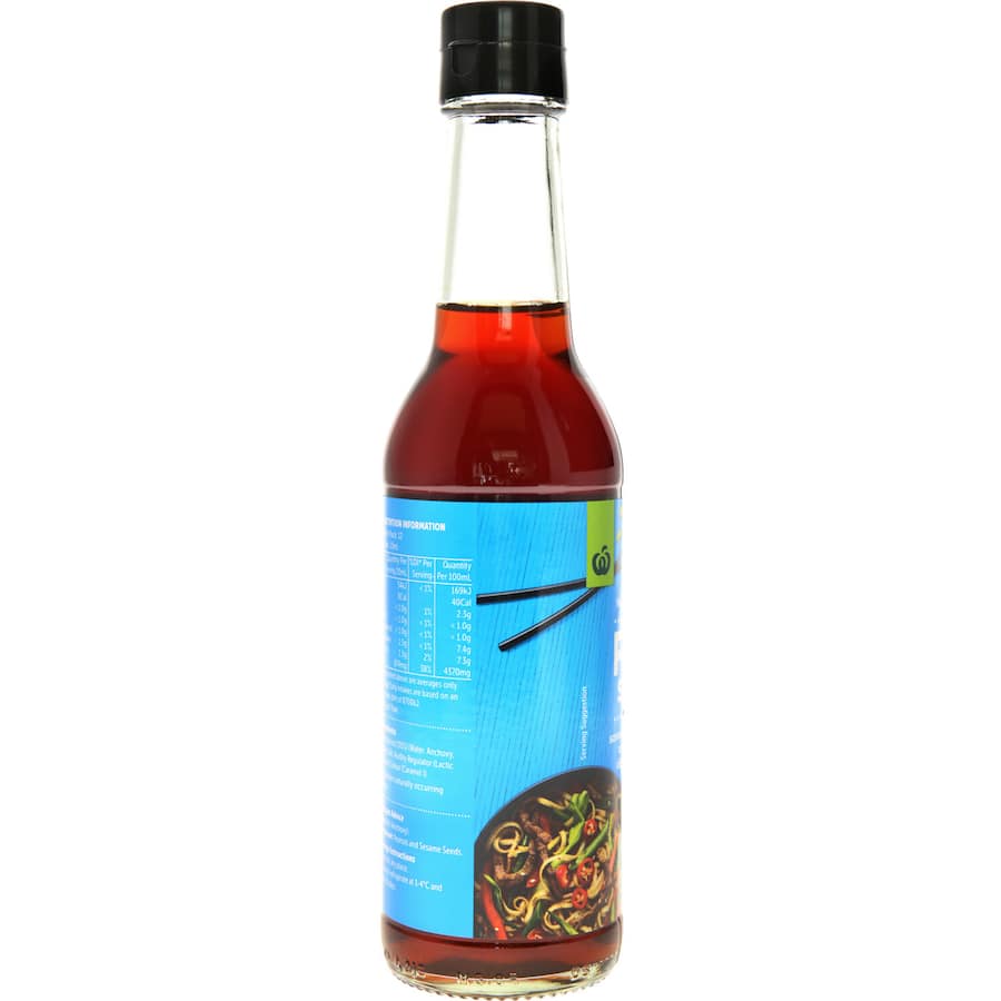 Woolworths Fish Sauce bottle showcasing a savory, umami-rich condiment for cooking and dipping, free from additives.