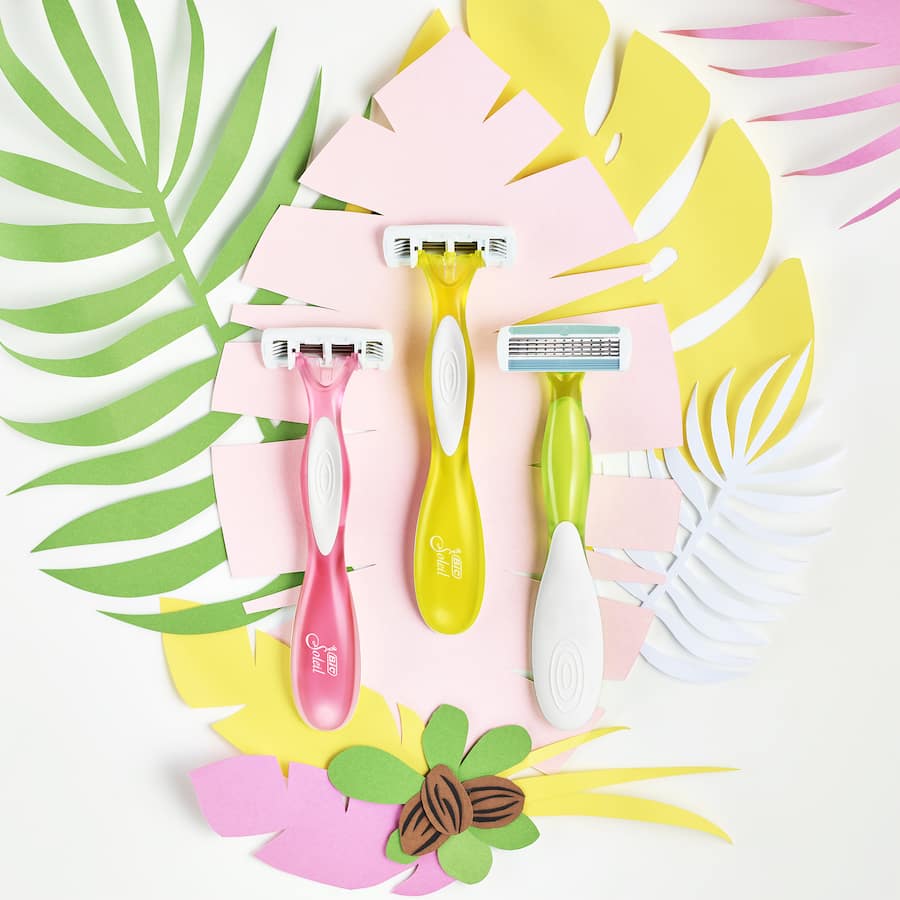 BIC Soleil Comfort Scented razor with 4 moveable blades, pivoting head, Shea Butter strip, and citrus-scented handle.