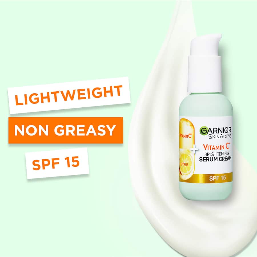 Garnier Skin Active Serum Cream with 20% Vitamin C and SPF 15 for brightening, hydrating, and protecting skin.