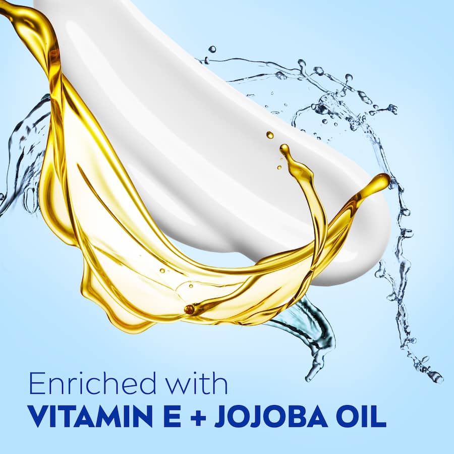 NIVEA Soft Day Cream with Jojoba & Vitamin E in a compact pot, lightweight and hydrating for all skin types.