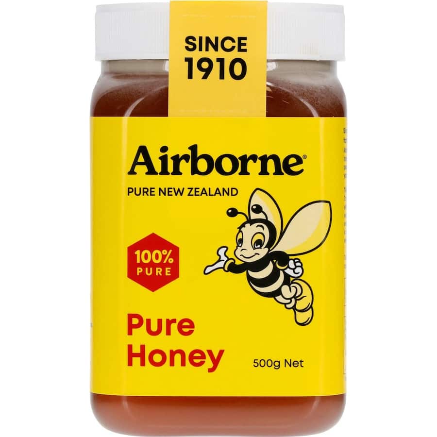 Natural liquid sweetness of Airborne Clover Honey, perfect for sweetening beverages and recipes.