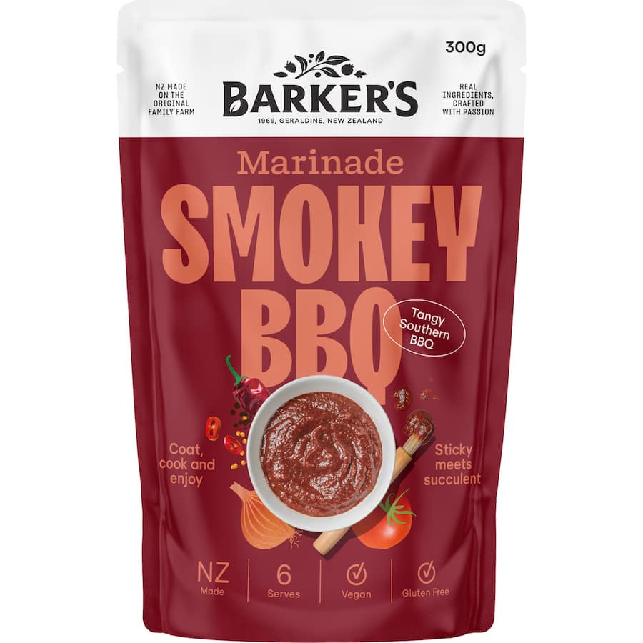 A bottle of Barker's BBQ Sauce Marinade Smokey, perfect for adding rich, smoky flavor to meats and veggies.