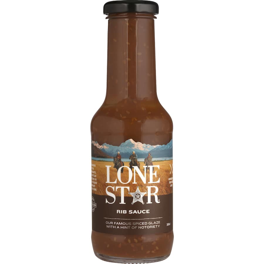 Bold and tangy Lone Star Rib Sauce, perfect for ribs, chicken, and veggies; gluten-free and award-winning BBQ delight.