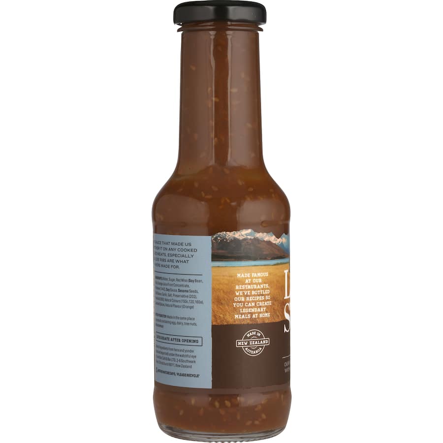 Lone Star Rib Sauce bottle showcasing its bold, tangy flavor, perfect for barbecue ribs, chicken, and grilled vegetables.