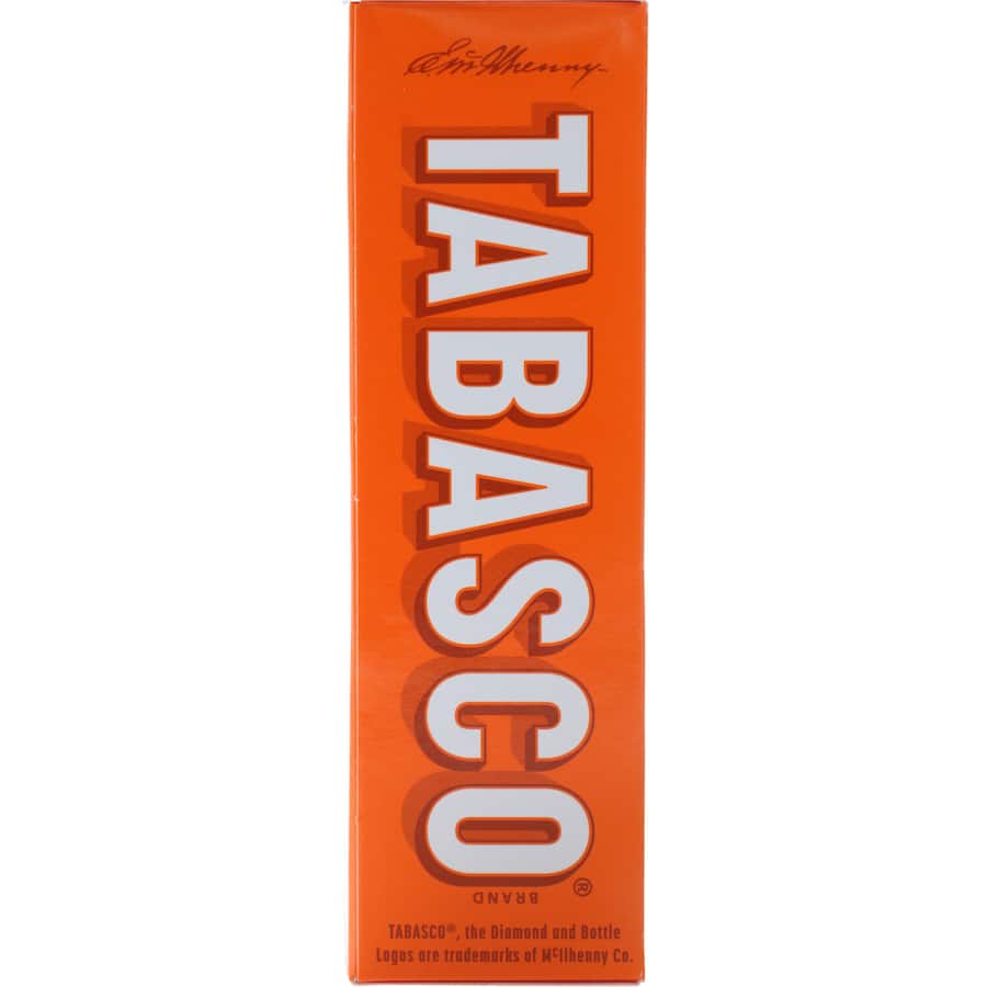 Bottle of McIlhenny Tabasco Sauce Red Pepper, a gluten-free hot sauce enhancing flavors in various dishes and cocktails.