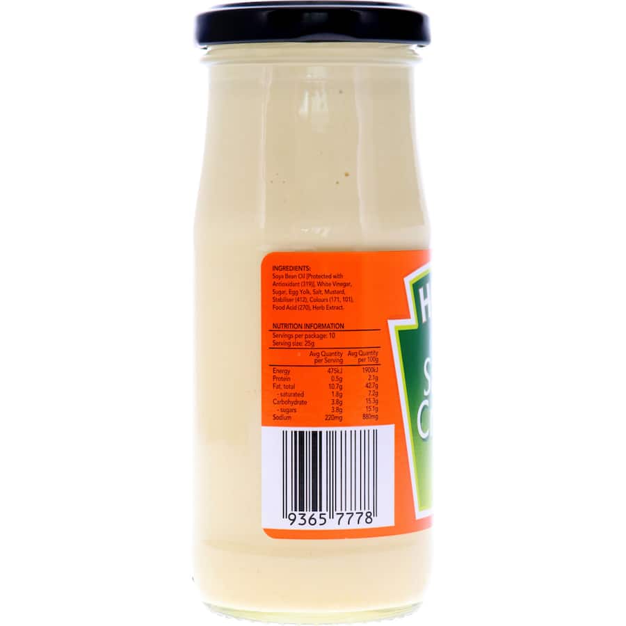 Heinz Salad Cream bottle with a creamy texture, ideal for enhancing salads, sandwiches, and barbecues with zesty flavor.