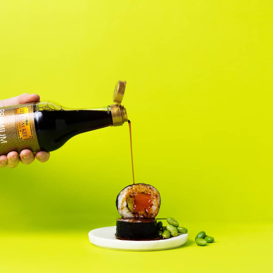 Lee Kum Kee Premium Dark Soy Sauce bottle showcasing rich color, ideal for enhancing flavors in stir-fries and marinades.