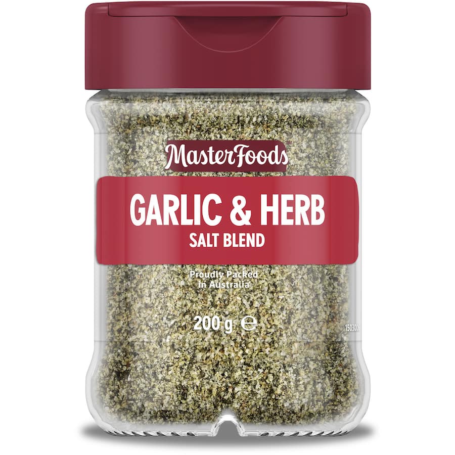 Masterfoods Garlic Herb Salt Blend in a glass shaker, perfect for adding savory garlic and herb flavor to various dishes.