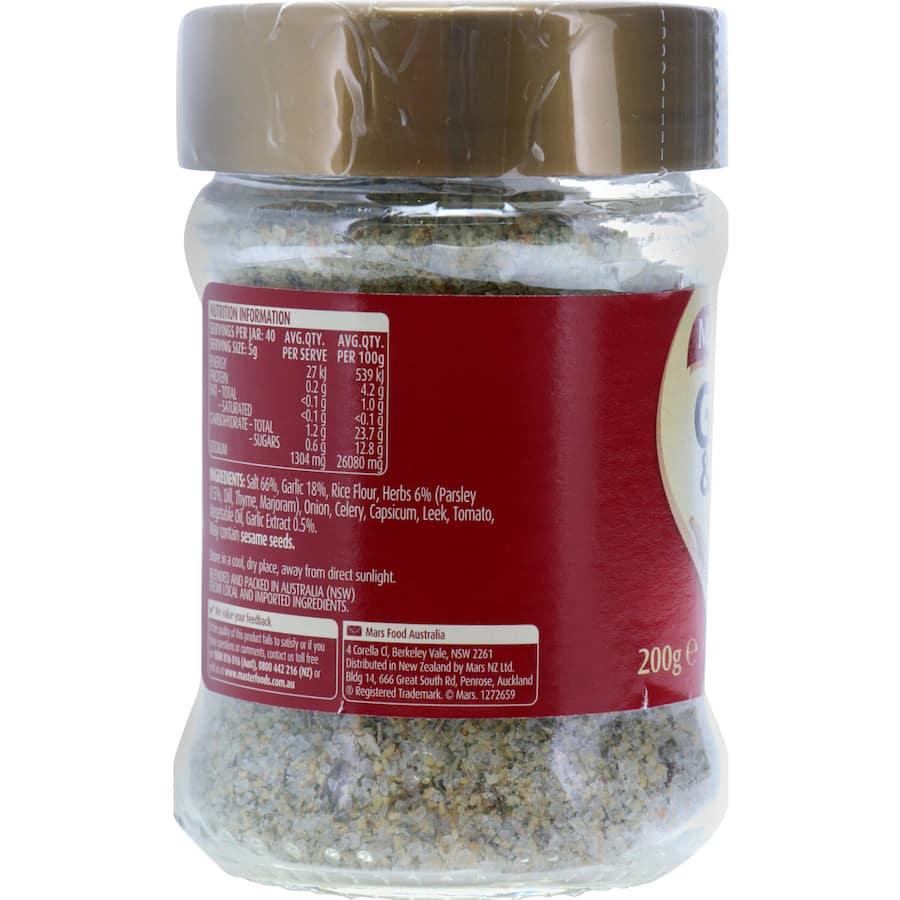 Masterfoods Garlic Herb Salt Blend in a glass shaker jar, ideal for enhancing flavors in meats, veggies, and potato dishes.