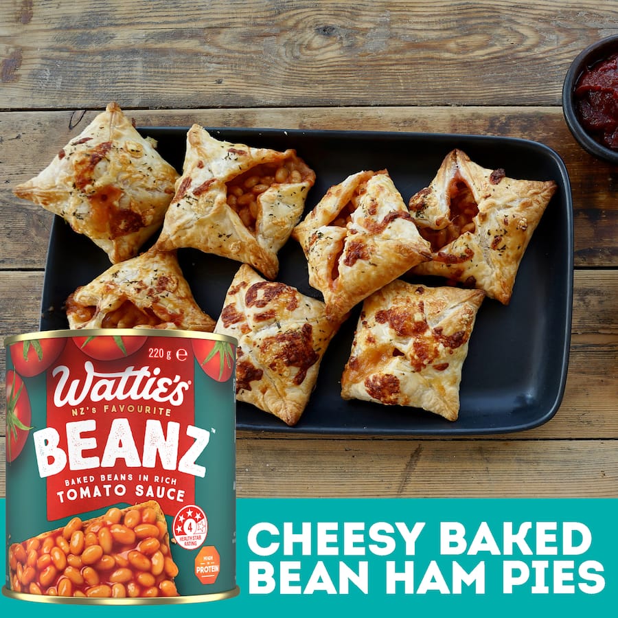 Wattie's Baked Beanz in tomato sauce, packed with protein, fiber, and no preservatives, perfect for versatile meals.