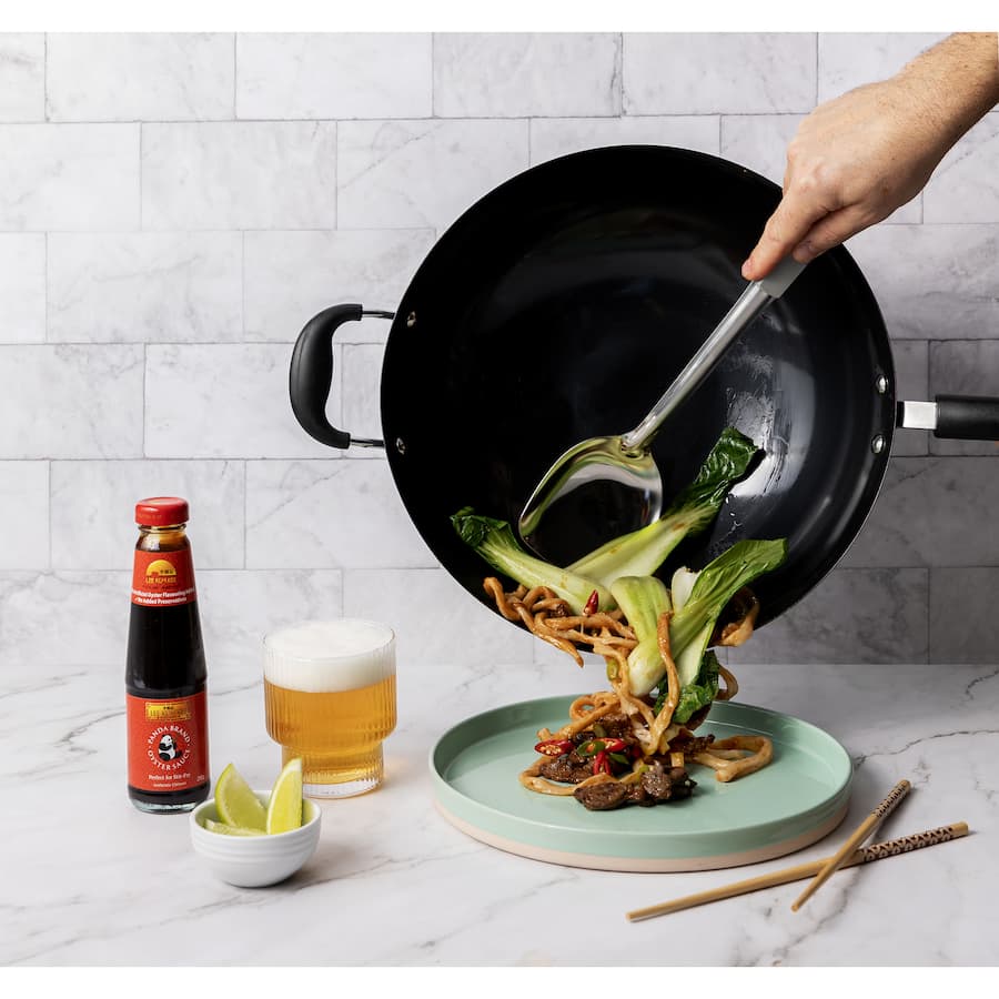 Lee Kum Kee Panda Brand Asian Oyster Sauce, featuring rich color and robust flavor, ideal for marinating and stir-frying.