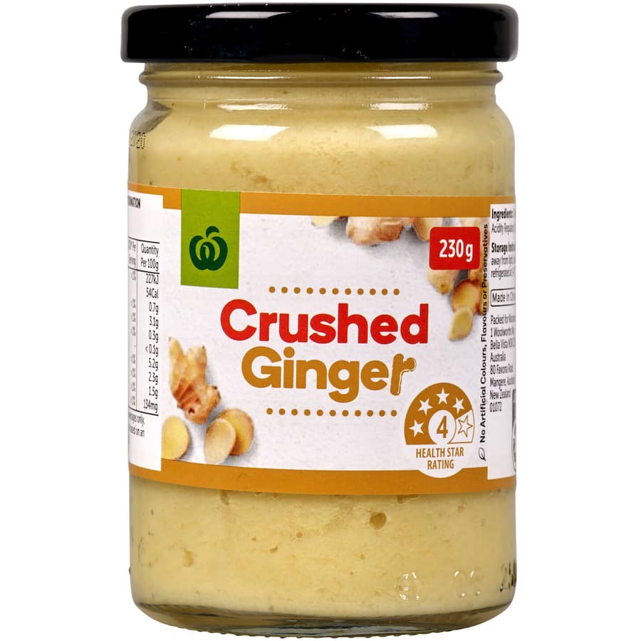 Woolworths Crushed Ginger in a jar, perfect for enhancing stir-fries and curries with authentic, vibrant flavor.
