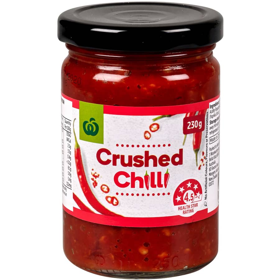Woolworths Crushed Chilli jar, a spice blend for enhancing dishes with natural heat and flavor, perfect for cooking enthusiasts.