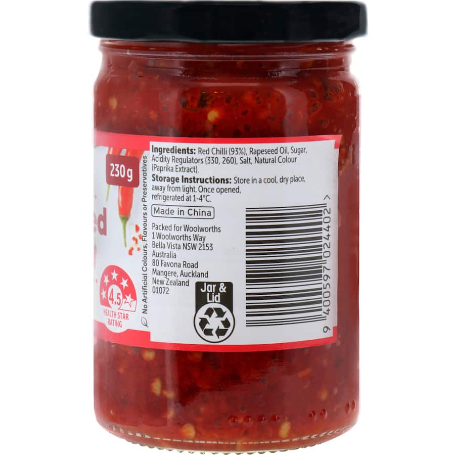 A jar of Woolworths Crushed Chilli, perfect for adding bold heat and flavor to stir-fries, curries, and marinades.