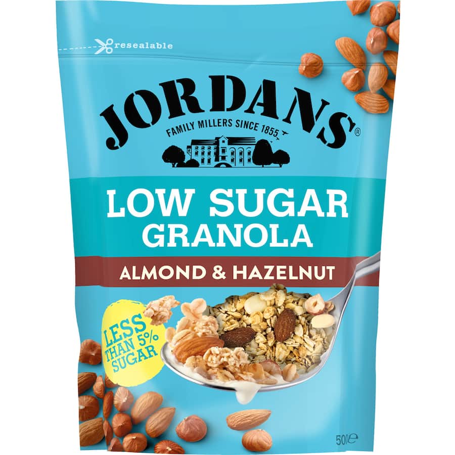 Nutty granola with almonds and hazelnuts, low in sugar, crafted for a delicious and healthier breakfast option.