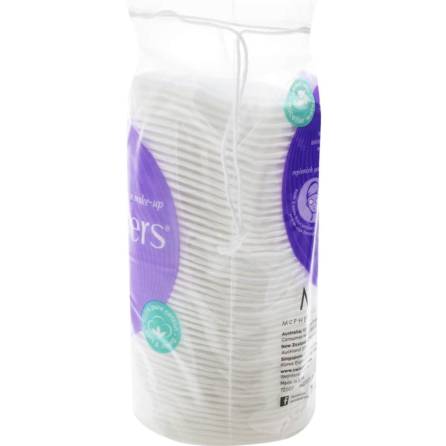 Extra-large Swisspers cotton pads made from 100% pure cotton for gentle makeup removal and skincare application.