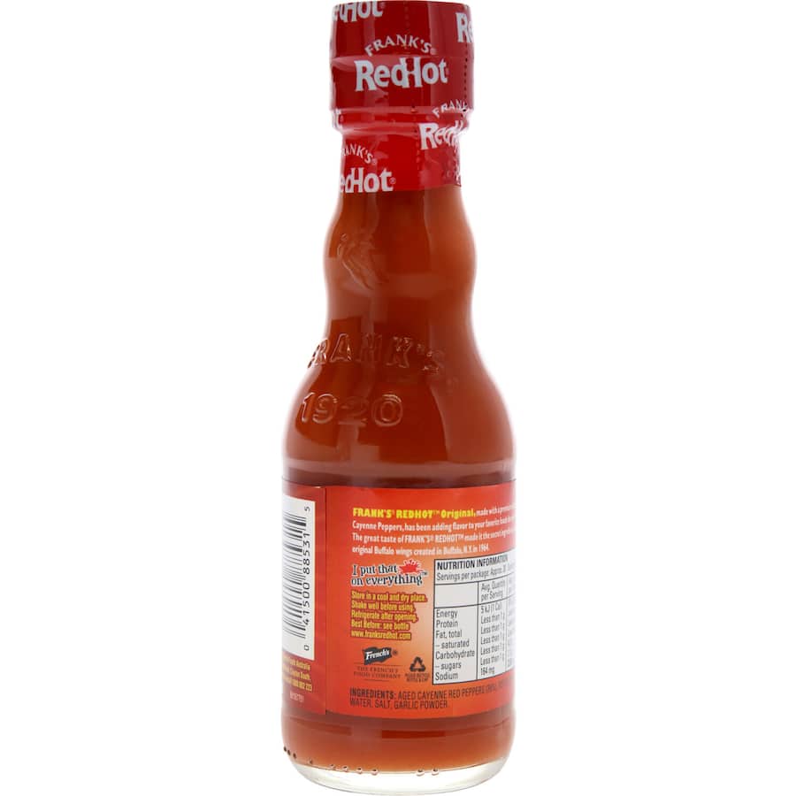 Bottle of Frank's Mexican Original Red Hot Sauce, showcasing vibrant red color, ideal for adding heat to various dishes.