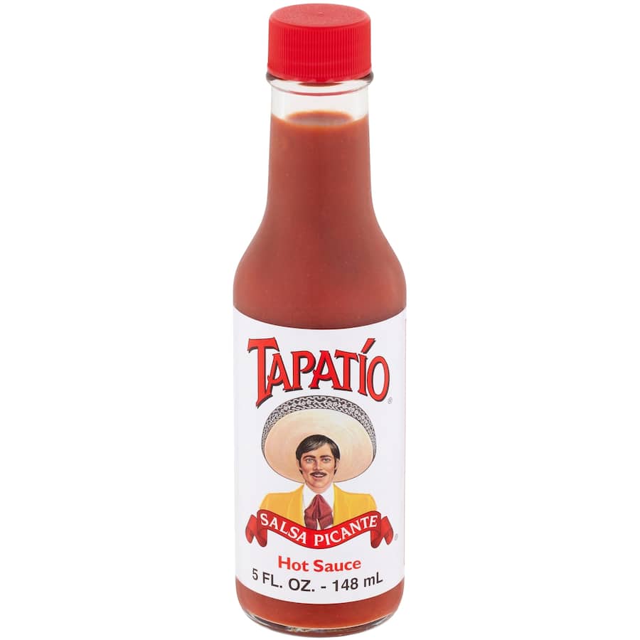Tapatio Mexican Hot Sauce bottle showcasing vibrant red sauce, perfect for spicing up tacos, eggs, and more.