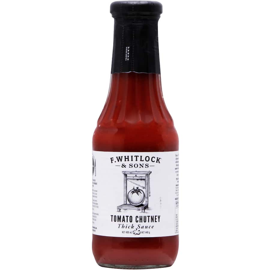 F. Whitlock & Sons Tomato Chutney Thick Sauce: a flavorful blend of tomatoes and apples, perfect for burgers and diverse dishes.