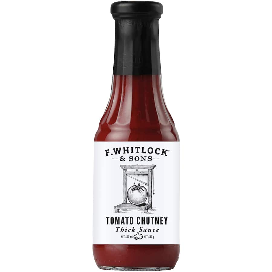 F. Whitlock & Sons Tomato Chutney Thick Sauce, a rich blend of tomatoes and apples, perfect for burgers, sandwiches, and marinades.