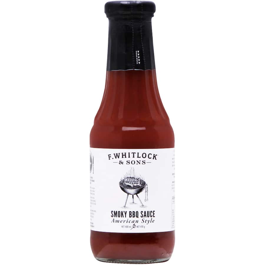F. Whitlock & Sons Smoky BBQ Sauce bottle, showcasing rich tomato, honey, and spice blend for perfect grilling flavor.
