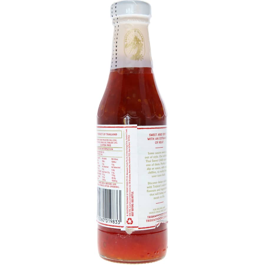 Trident Sweet Chilli Sauce Hot bottle showcasing its vibrant color, ideal for adding heat and flavor to various dishes.